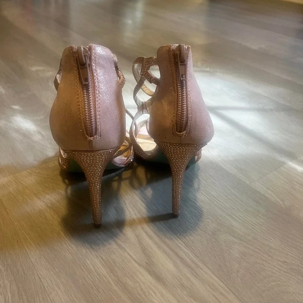 Betsy Johnson Rose gold strappy heels with rhinestones and blue bottom.